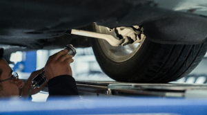 Mechanic checking wheel